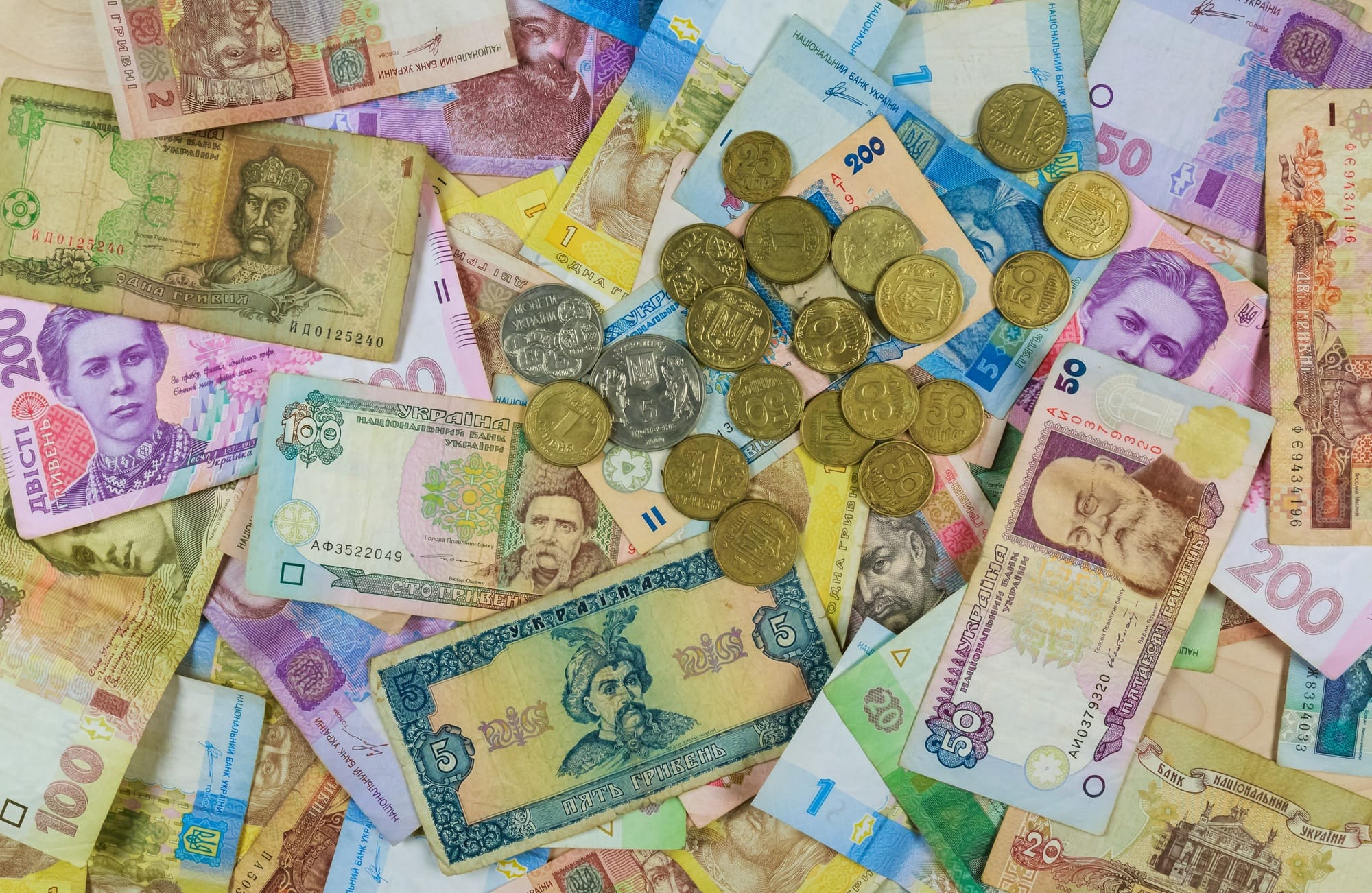 Different currency bills creating a colorful background Money from different countries